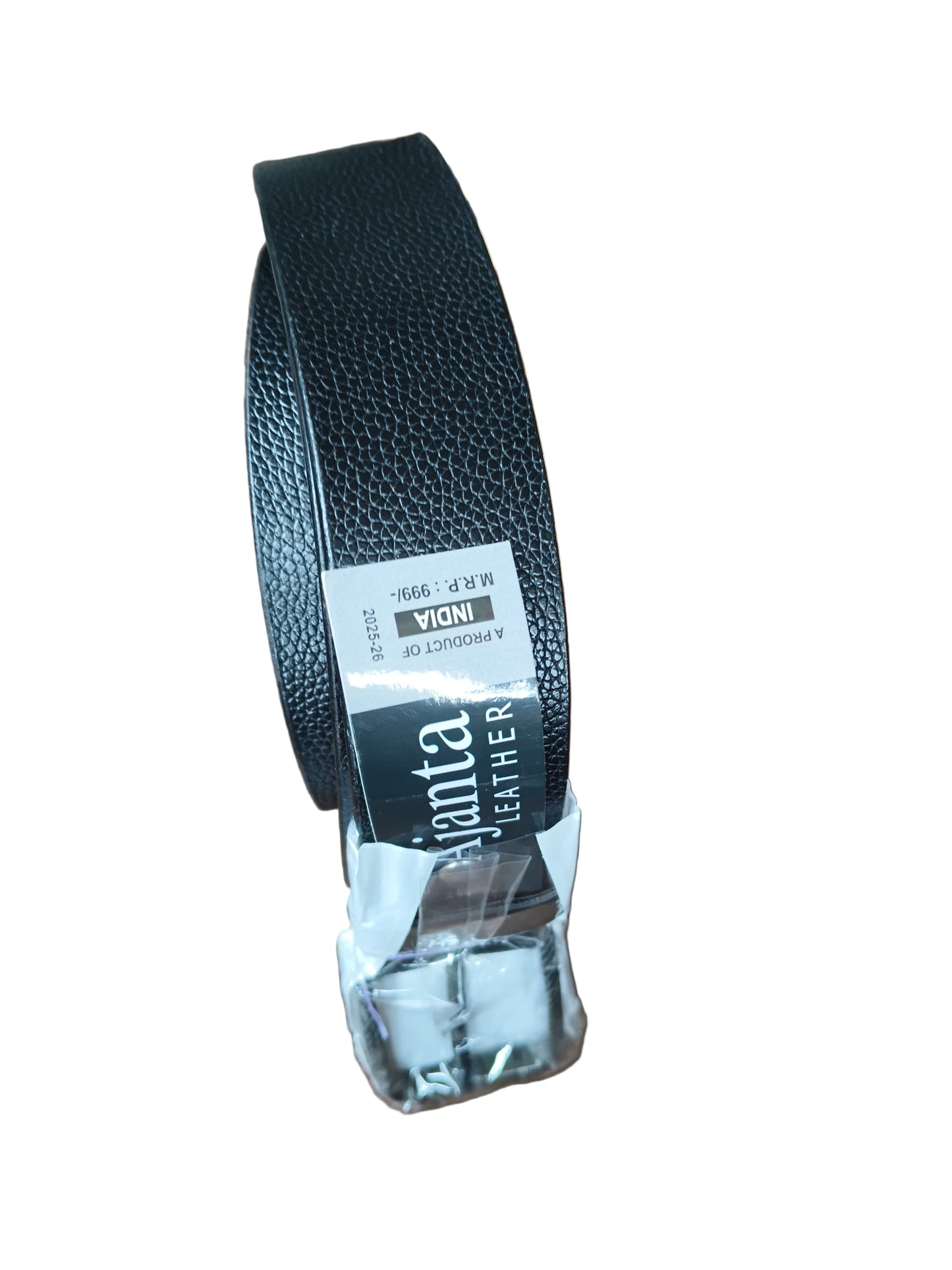Black belt with a visible brand label on a wooden surface