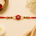 Traditional Red Flower Pearl Rakhi Online | Raksha Bandhan