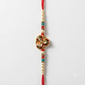 Handcrafted Meenakari Floral Kundan Rakhi Set (Pack of 12) with Wooden Velvet Box