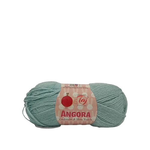 A skein of Angora yarn in a dusty sage green color with a pink paper label, shown on a clean white background.