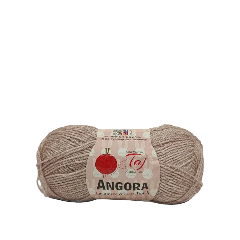 A skein of beige yarn with a white and red label reading 'Angora'