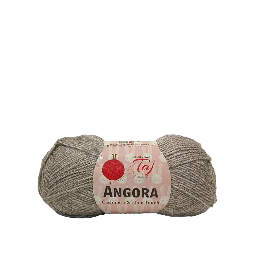 A skein of Taj Knitline Angora yarn in a soft beige-gray color, featuring a pink paper label 