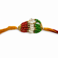 A beaded Rakhi featuring red and green bead 