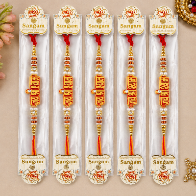 Five packaged Rangoli wall decor pieces labeled 'Sangam
