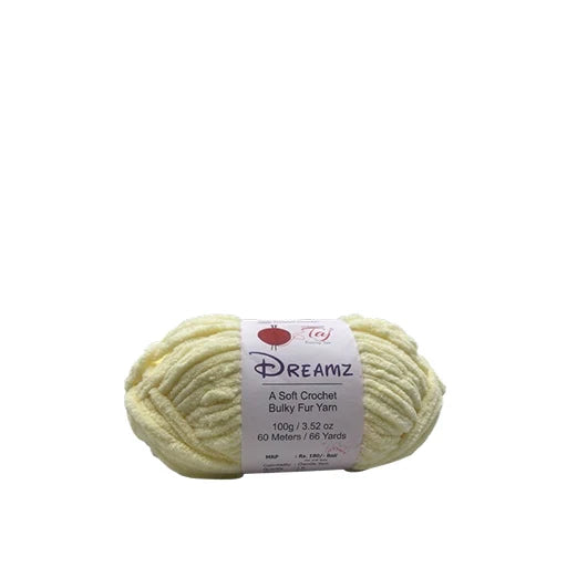 A ball of pale yellow Dreamz Bulky Fur Yarn with a white paper label, set against a plain white background.