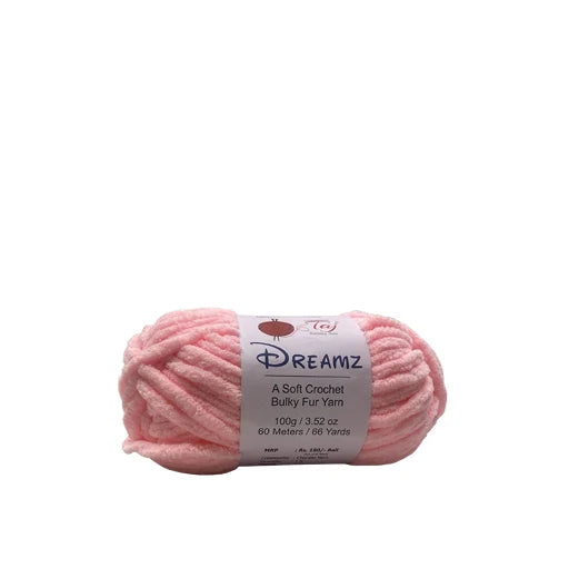 A skein of light pink Dreamz crocheted yarn with a white paper label