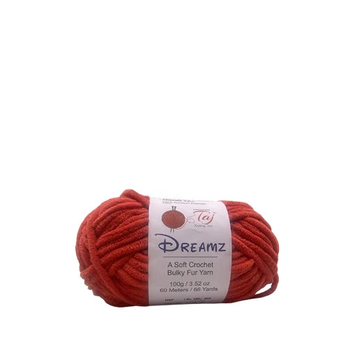 A skein of Dreamz Bulky Fuzzy Yarn in a vibrant red-orange color,