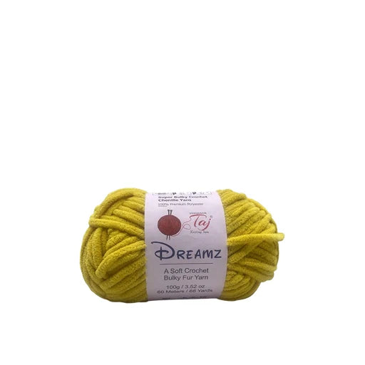 A skein of Dreamz brand yellow crochet bulky fur yarn with a white paper label,