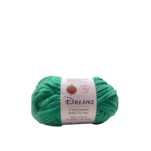 A ball of teal green Dreamz Bulky Fur Yarn with a white paper label, 