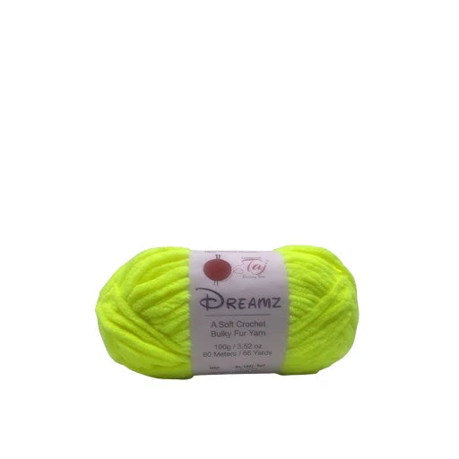 A bright neon yellow-green skein of Dreamz Bulky Fur Yarn with a white paper label, 