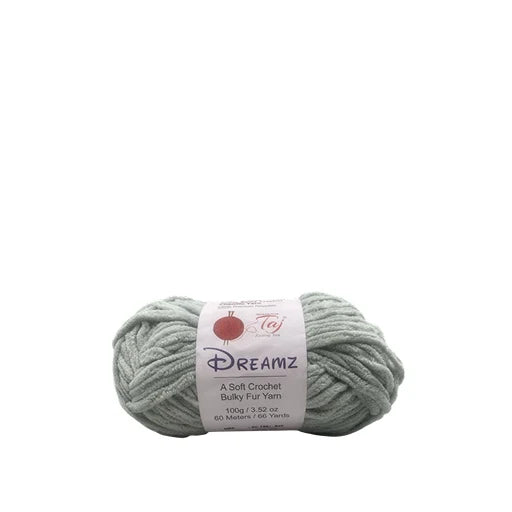A single skein of Dreamz Bulky Fur Yarn in a muted sage green color, 