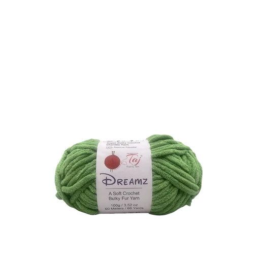A skein of green yarn with a white paper label in the center,