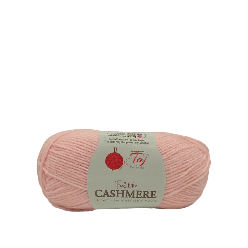 A single ball of light pink yarn with a paper label reading 'Feel like CASHMERE' 