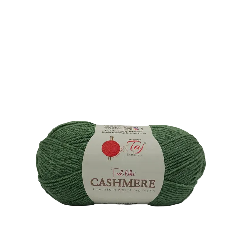 A skein of green cashmere yarn with a white paper label, displayed on a clean white background with a soft shadow.