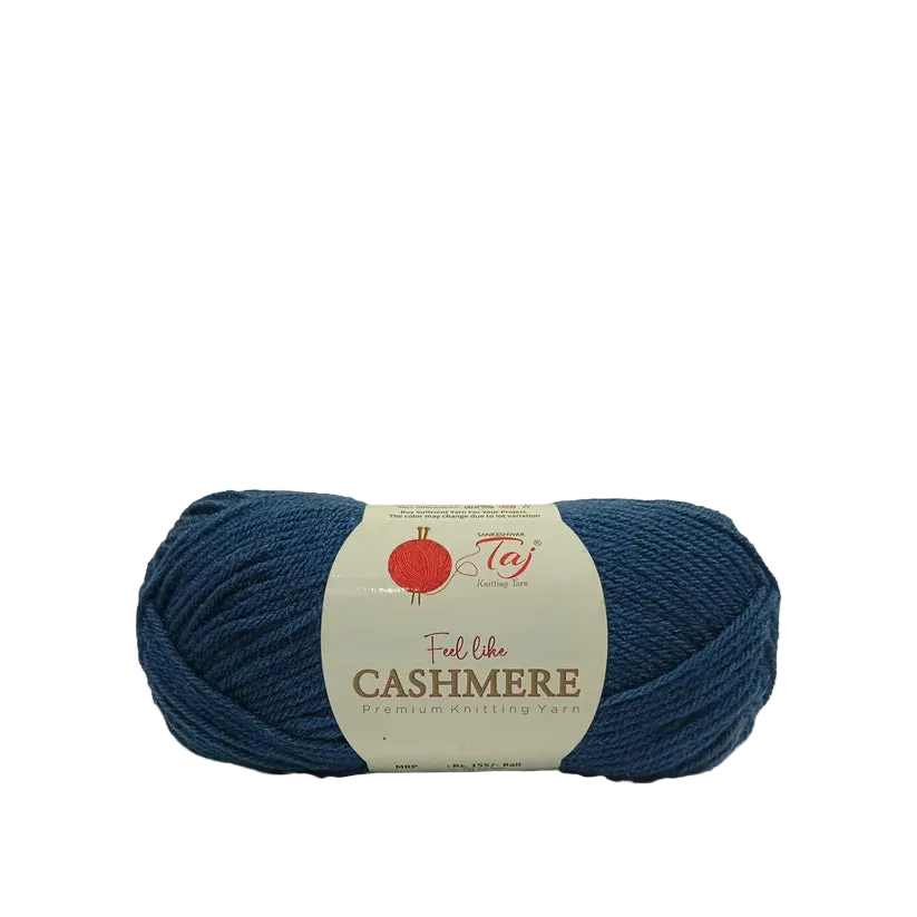 A skein of navy blue yarn with a cream-colored paper label that reads