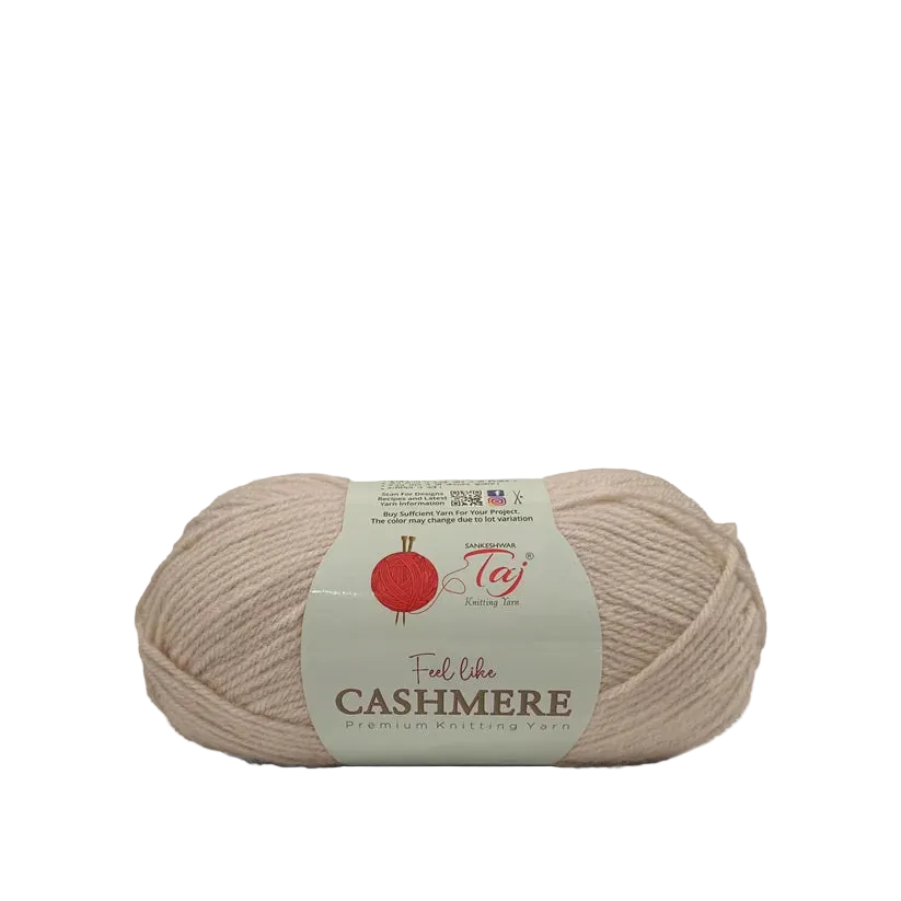 A single skein of Cashmere yarn in a soft beige color, wrapped with a paper label