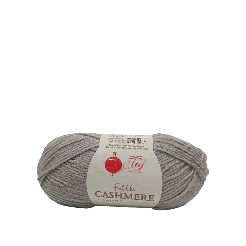 A skein of light gray Cashmere yarn with a white paper label