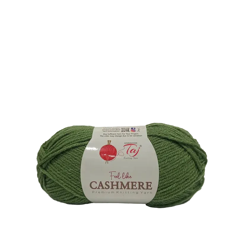 A skein of green yarn with a white paper label that reads 'Feel like CASHMERE'