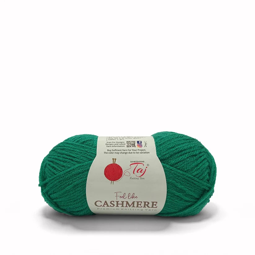 A skein of teal green yarn with a white paper label that reads 'Full bice CASHMERE' 