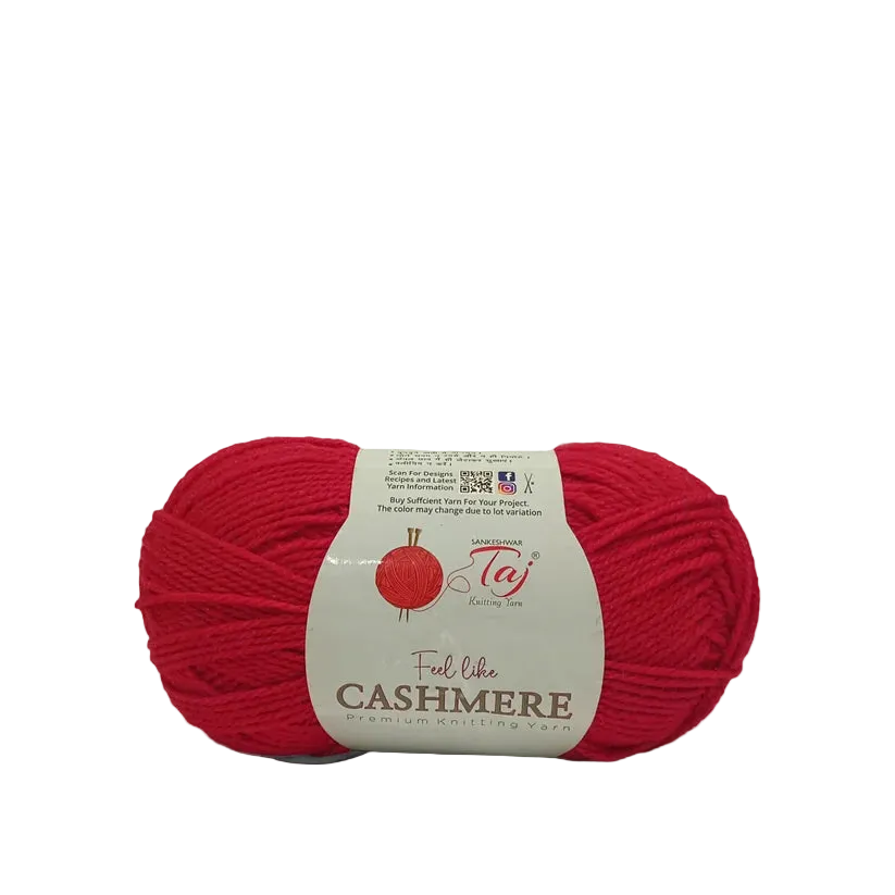 A skein of bright red yarn with a cream-colored paper label that reads 'Feel Like CASHMERE'