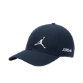 A navy blue baseball cap featuring a white embroidered Jumpman logo on the front and 'JORDAN' text on the side, set against a plain light gray background.