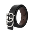 A black textured leather belt with a large silver-tone interlocking double-ring buckle, coiled on a white background.