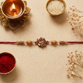 Jai Shree Premium Wooden Ganesha Designer Rakhi with Decorative Beads & Sacred Red Thread for Raksha Bandhan