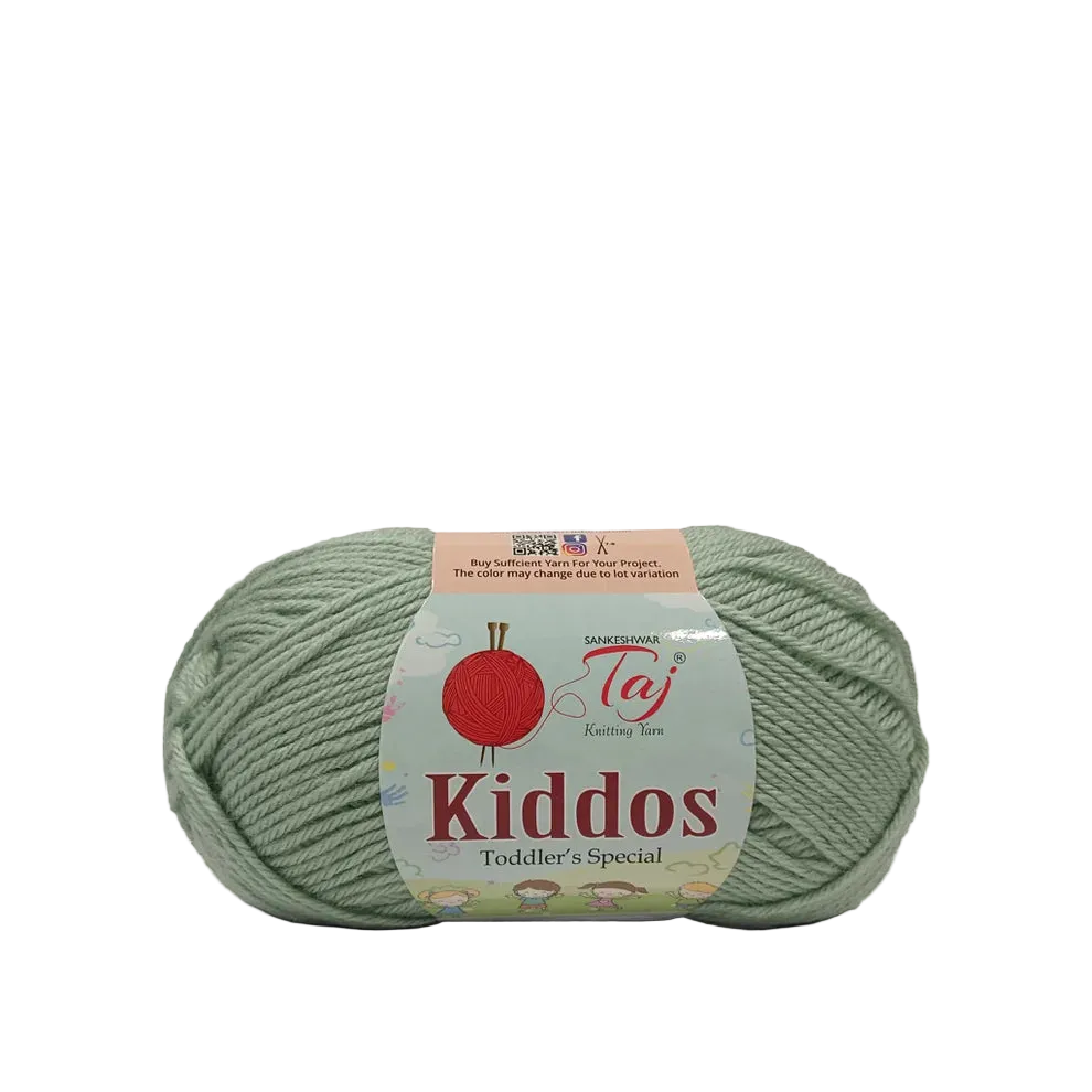 A skein of light sage green yarn with a paper label reading 'Kiddos Toddler's Special' 