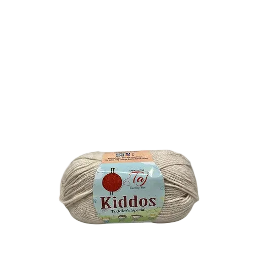 A skein of Taj Kiddos Toddler + Special yarn in a light beige color