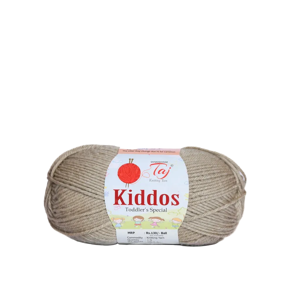 A single skein of Taj Kiddos Toddler's Special yarn in a warm beige color