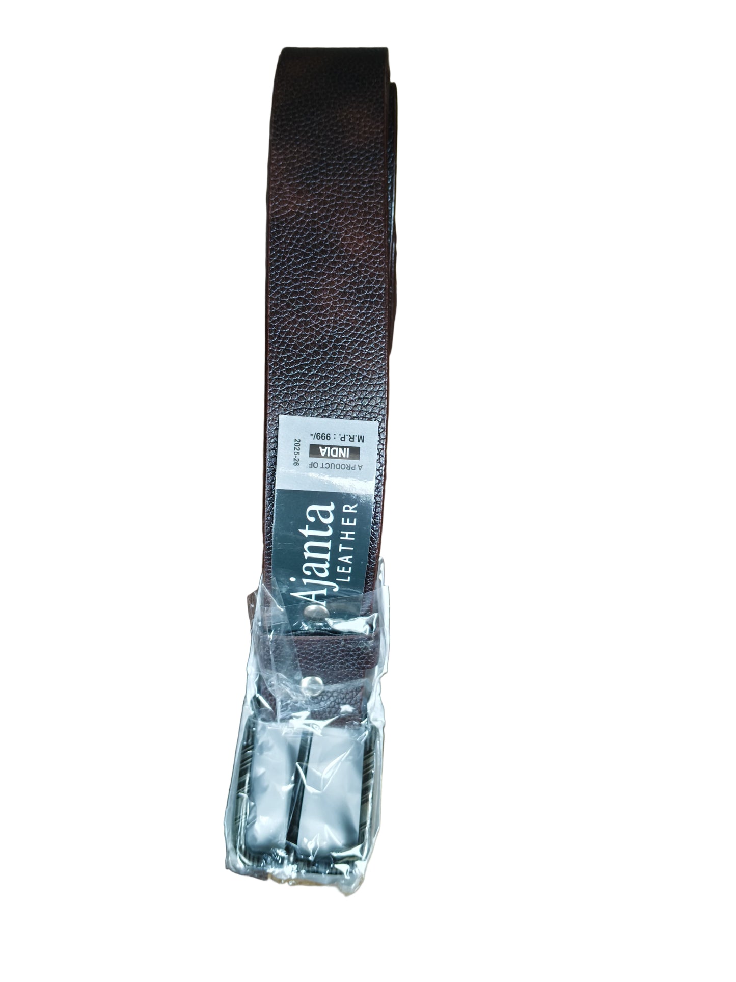 Brown leather belt with packaging on a wooden surface