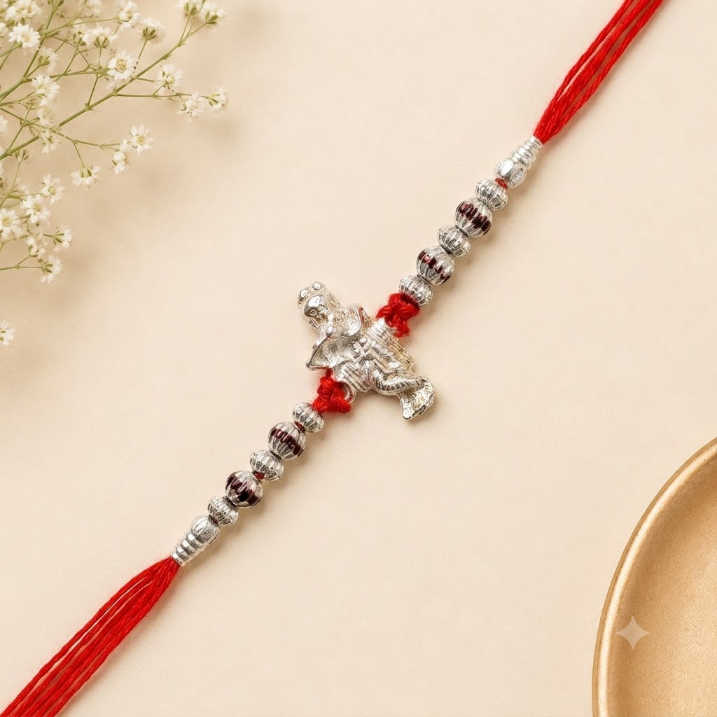 Premium Silver Krishna Rakhi Set (Pack of 12) with Velvet Wooden Box