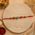 Premium Om Designer Rakhi with Silver Beads & Sacred Red Thread for Raksha Bandhan