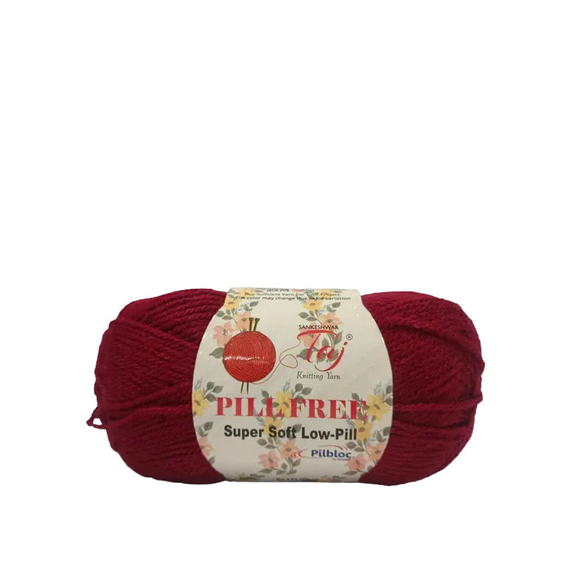 A skein of burgundy yarn with a cream-colored paper label that reads 'PILL FREE Super Soft Low-Pill'