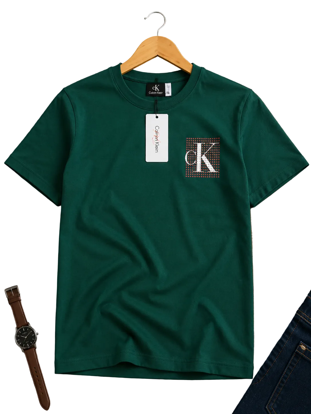 A dark green Calvin Klein t-shirt on a wooden hanger