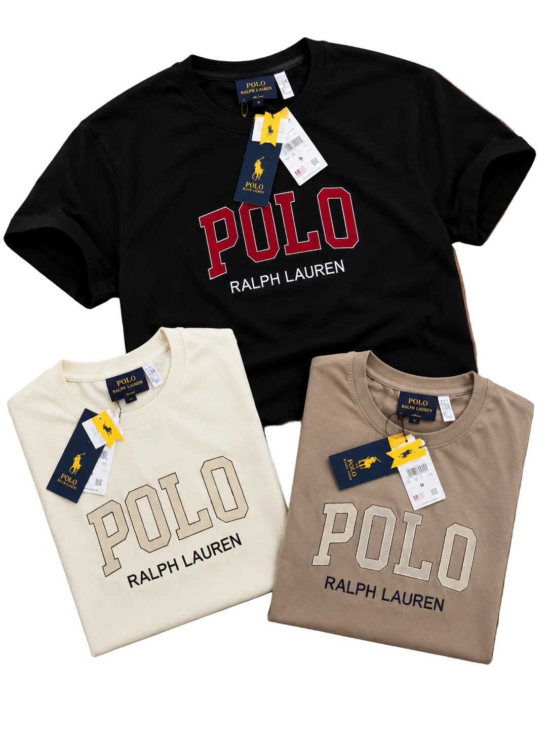 Three folded Ralph Lauren Polo T-shirts in black, cream, and taupe, each with a large 'POLO'