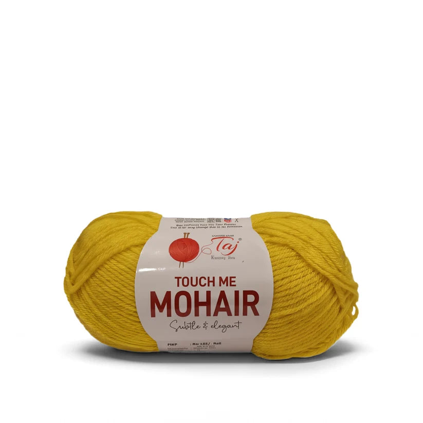A skein of yellow mohair yarn with a white paper label that reads 'TOUCH ME MOHAIR'