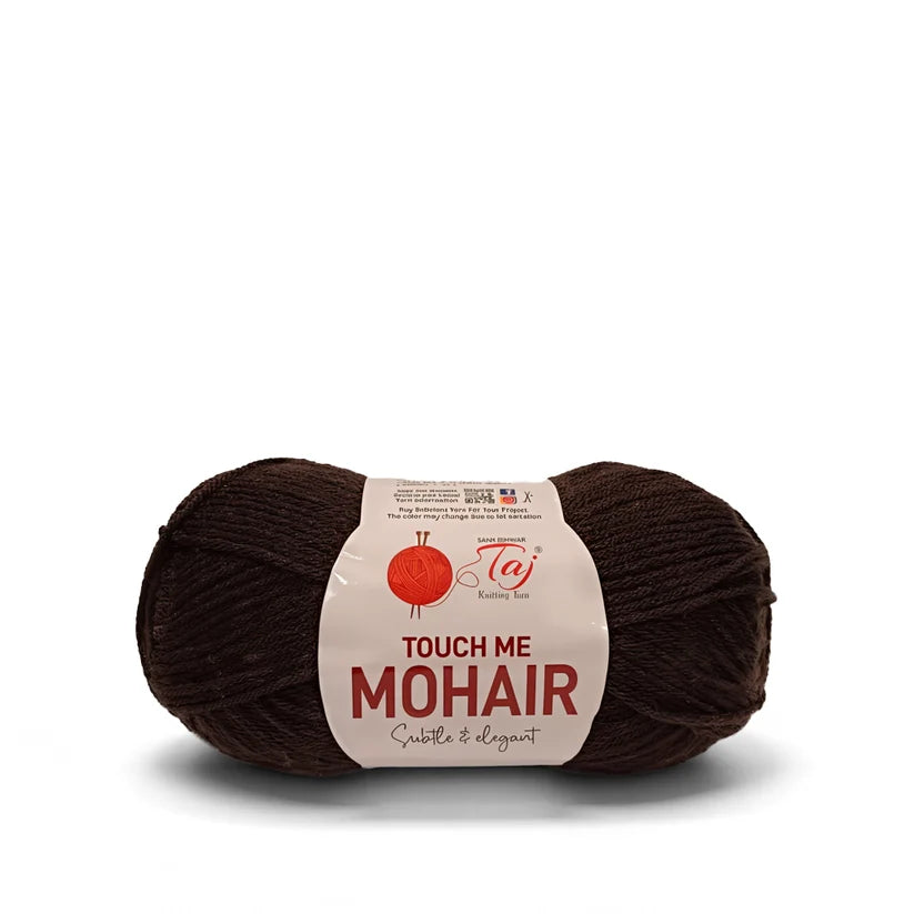 A skein of dark brown mohair yarn with a white paper label that reads 'TOUCH ME MOHAIR'