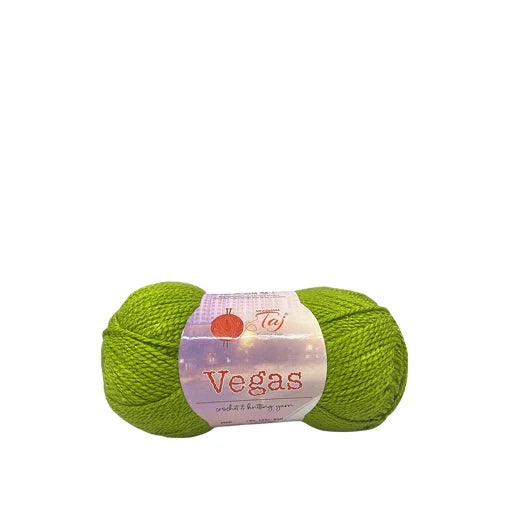 Green skein of yarn with a label on a white background