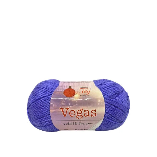 A skein of purple crochet knitting yarn with a paper label that reads 'Vegas crochet knitting yarn'
